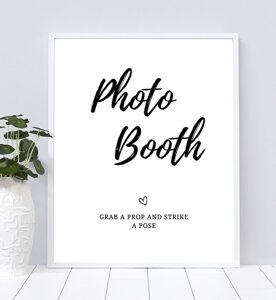 Photo Booth. Grab a prop and strike a pose.